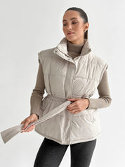 Puff quilted vest with a cream belt