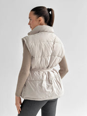 Puff quilted vest with a cream belt