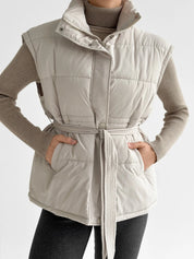 Puff quilted vest with a cream belt