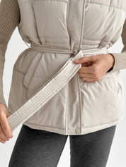 Puff quilted vest with a cream belt