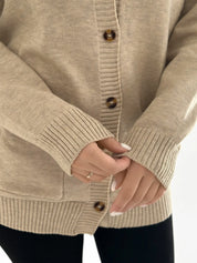 Knitted cardigan elongated with buttons beige