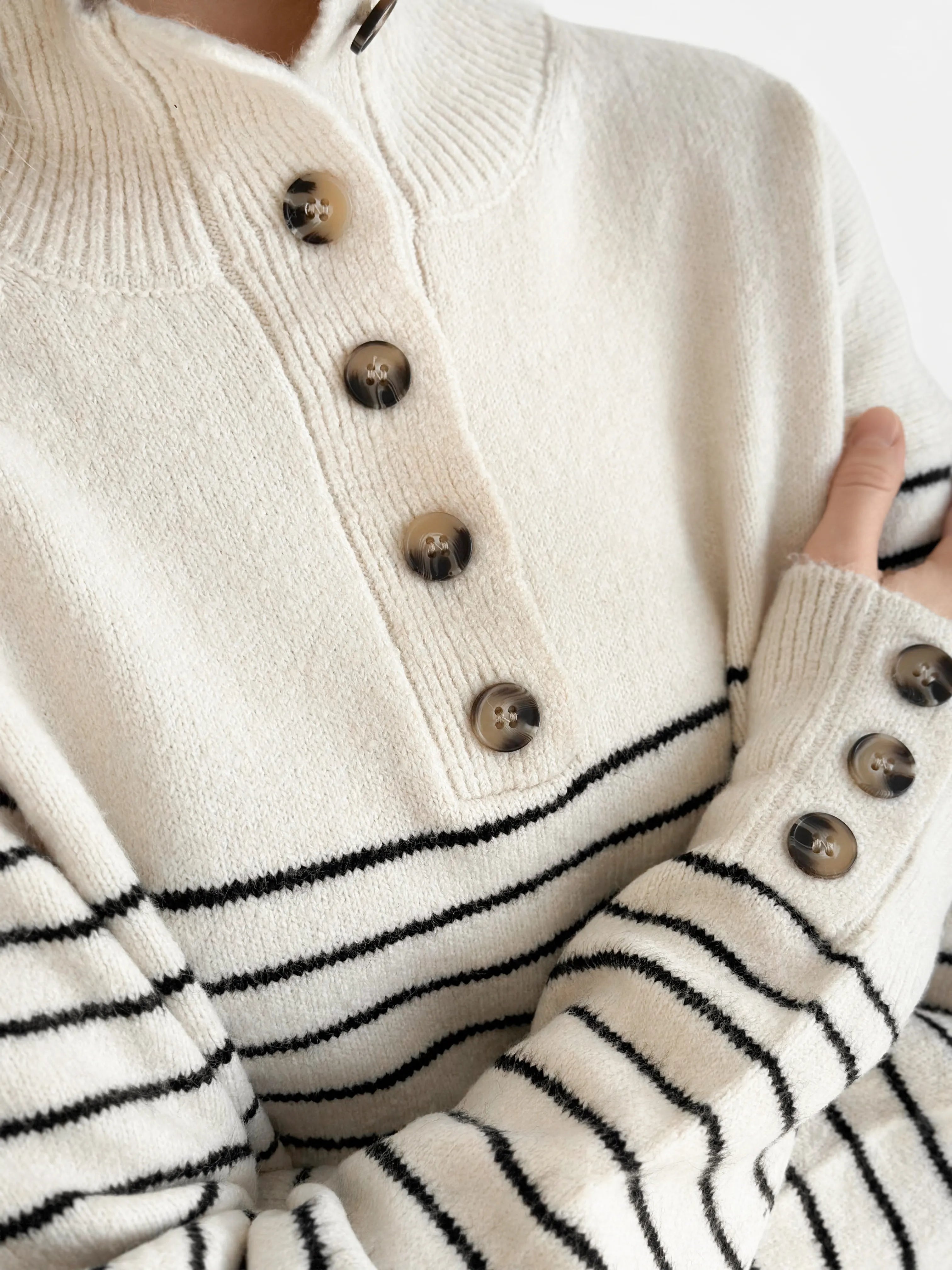 Wool sweater with striped collar