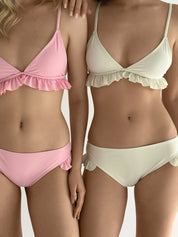 Swimsuit with ruffles, milky