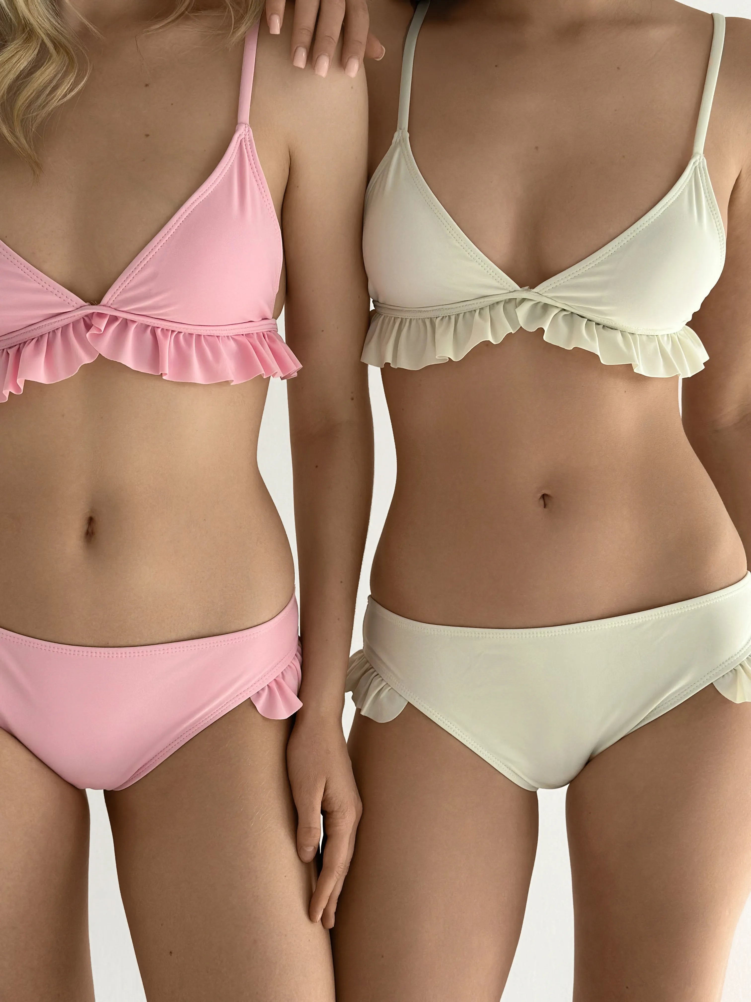 Swimsuit with ruffles, milky