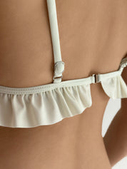 Swimsuit with ruffles, milky