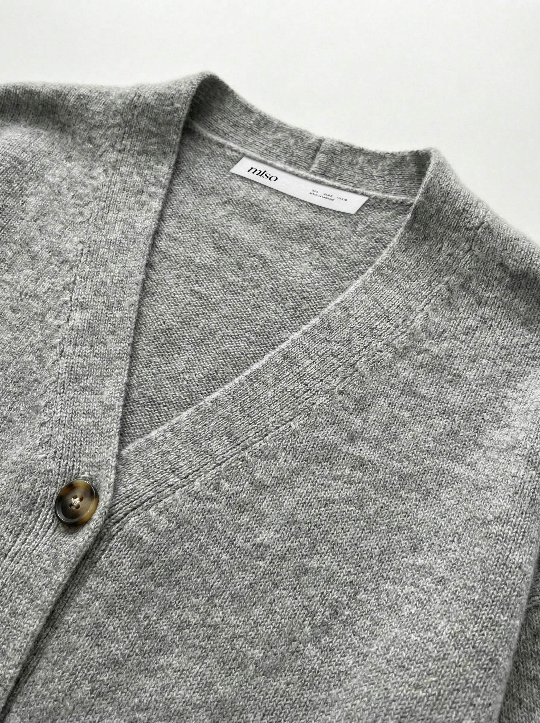 Set knitted cardigan with belt and gray pants
