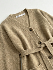 Set knitted cardigan with belt and beige pants