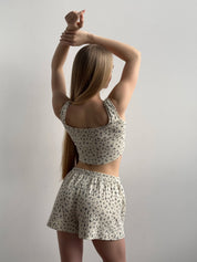 Ribbed mini top in milky blue with a little flower