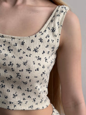 Ribbed mini top in milky blue with a little flower