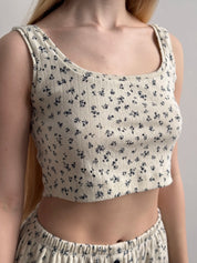 Ribbed mini top in milky blue with a little flower