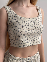 Ribbed mini top in milky blue with a little flower