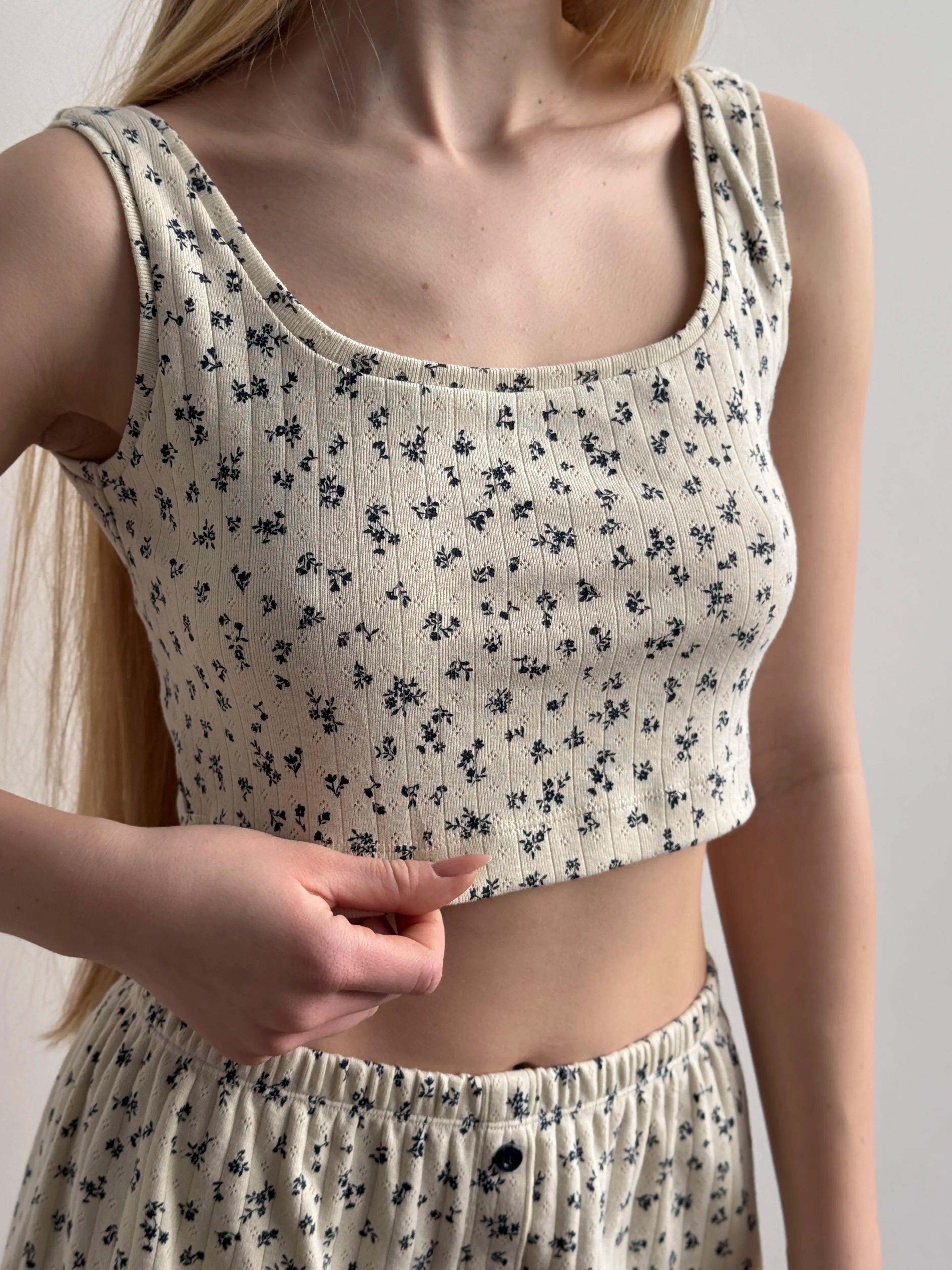 Ribbed mini top in milky blue with a little flower