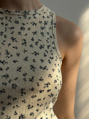 Ribbed T-shirt milk color with a blue flower