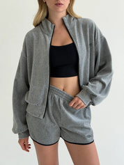 Velour sports suit with zip-up jacket and striped shorts, grey melange