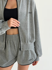 Velour sports suit with zip-up jacket and striped shorts, grey melange