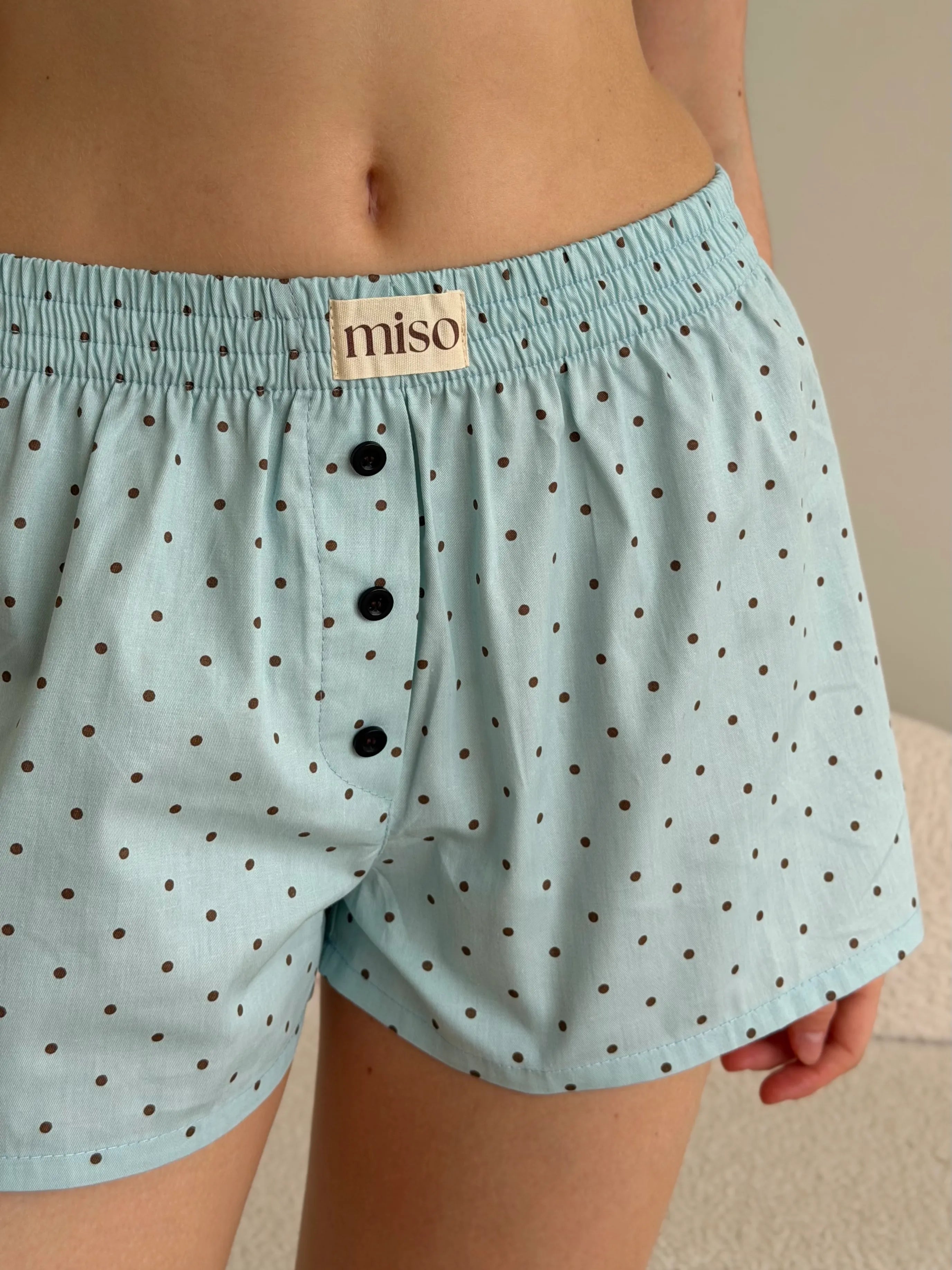 Satin shorts, small black polka dots on blue