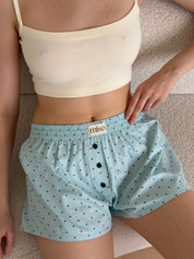 Satin shorts, small black polka dots on blue