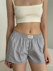 Satin shorts, small polka dots, white on gray