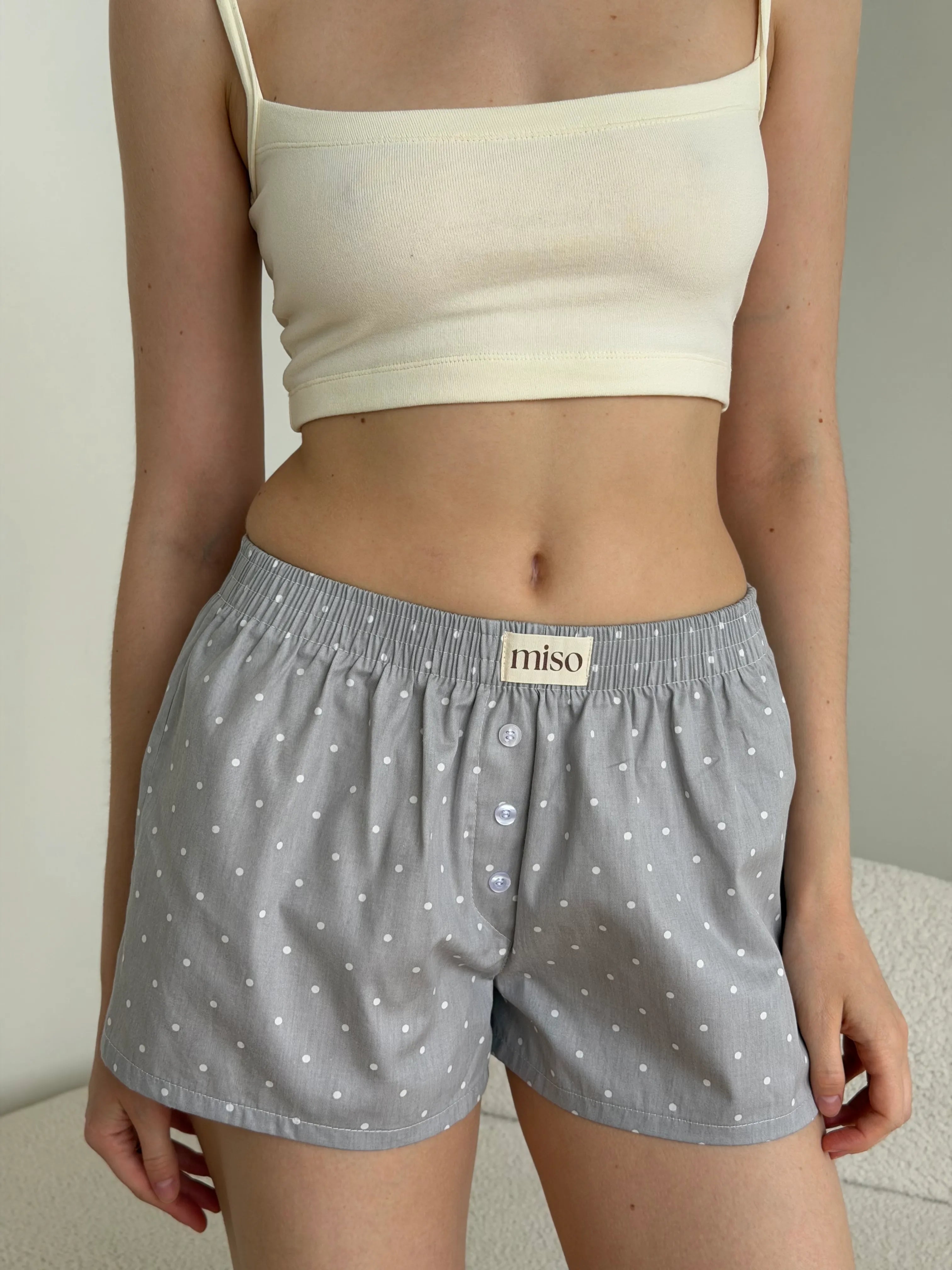 Satin shorts, small polka dots, white on gray