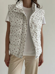 Quilted puffy vest, white with pink flower, onesize