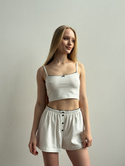 Knitted shorts with a gull in blue polka dots