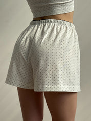Knitted shorts with a gull in blue polka dots