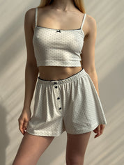 Knitted shorts with a gull in blue polka dots