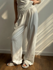 Knitted suit wide pants and polka dot T-shirt in blue on white