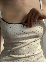 Knitted tank top with blue polka dots