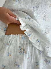 Muslin T-shirt and Shorts costume flower with blue leaf on milky