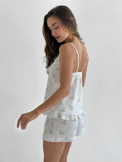 Muslin T-shirt and Shorts costume flower with blue leaf on milky