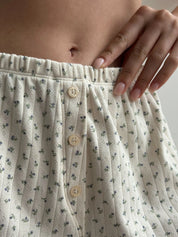 Ribbed shorts with a blue flower