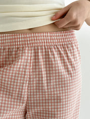 Cotton checked pants with flounce at the bottom, powder/milk