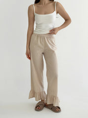 Cotton checked trousers with flounce at the bottom, beige/milk