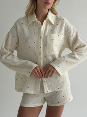Long sleeve shirt and muslin shorts suit, large black polka dots on milky