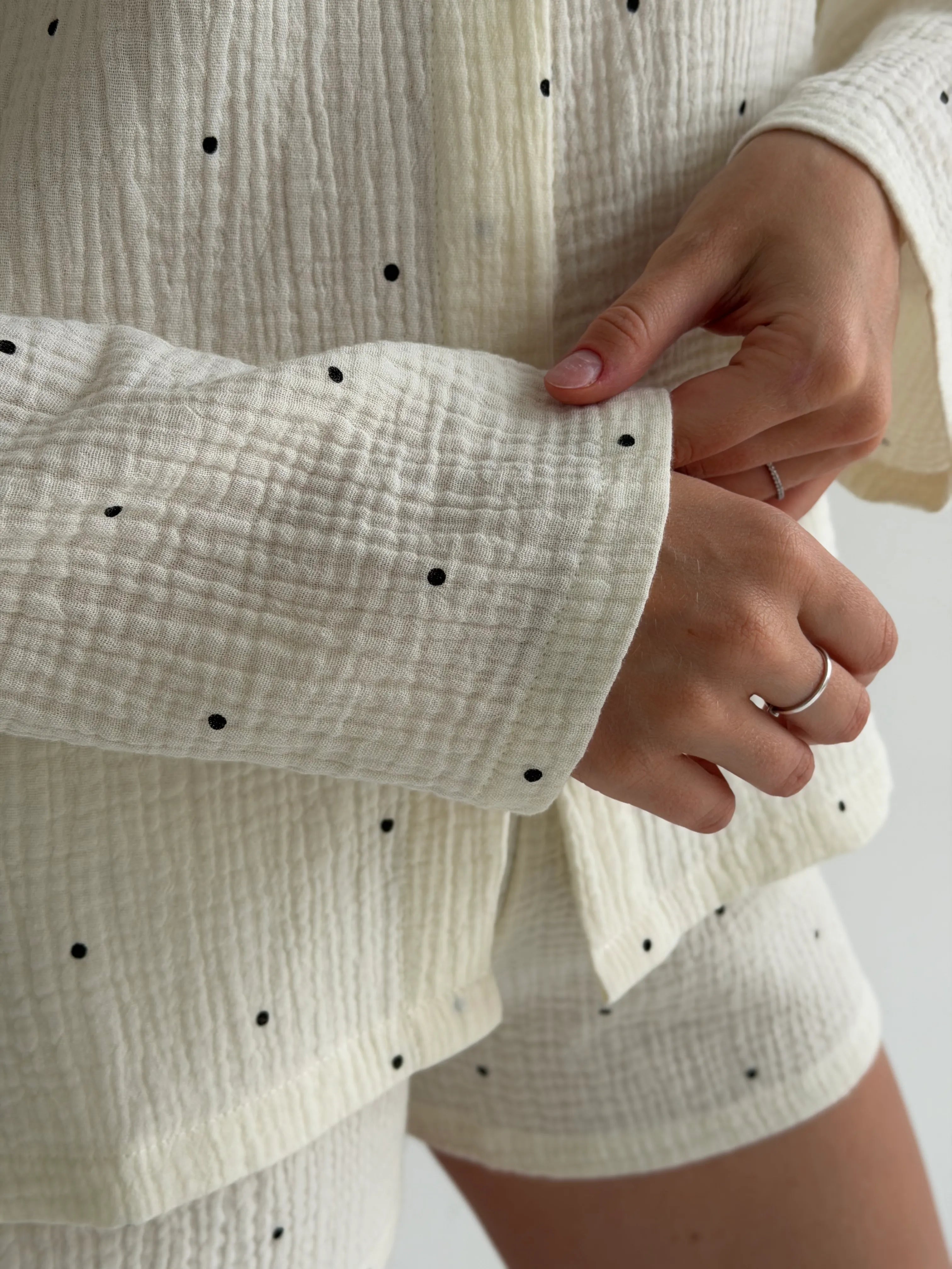 Long sleeve shirt and muslin shorts suit, large black polka dots on milky