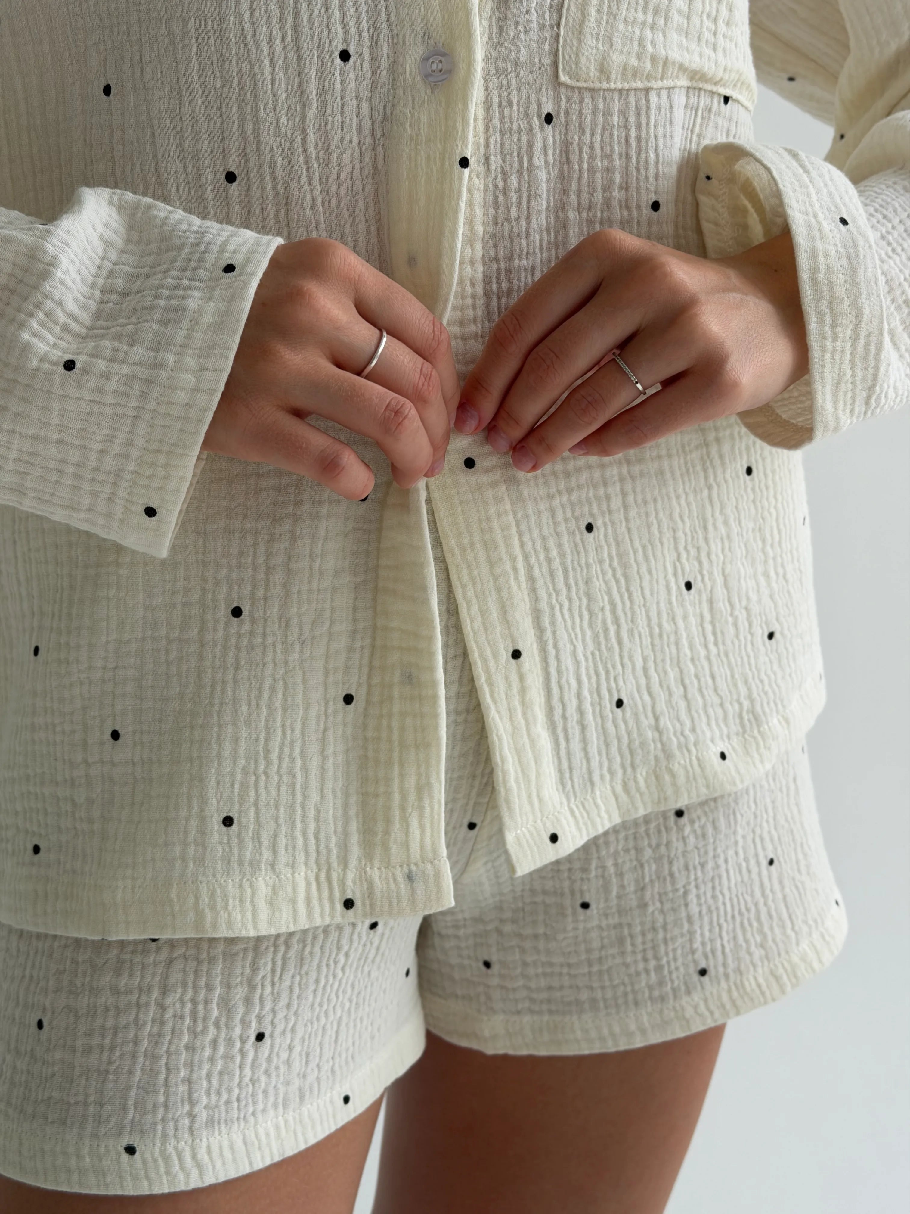 Long sleeve shirt and muslin shorts suit, large black polka dots on milky