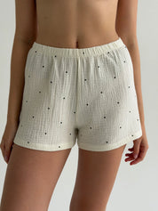 Long sleeve shirt and muslin shorts suit, large black polka dots on milky