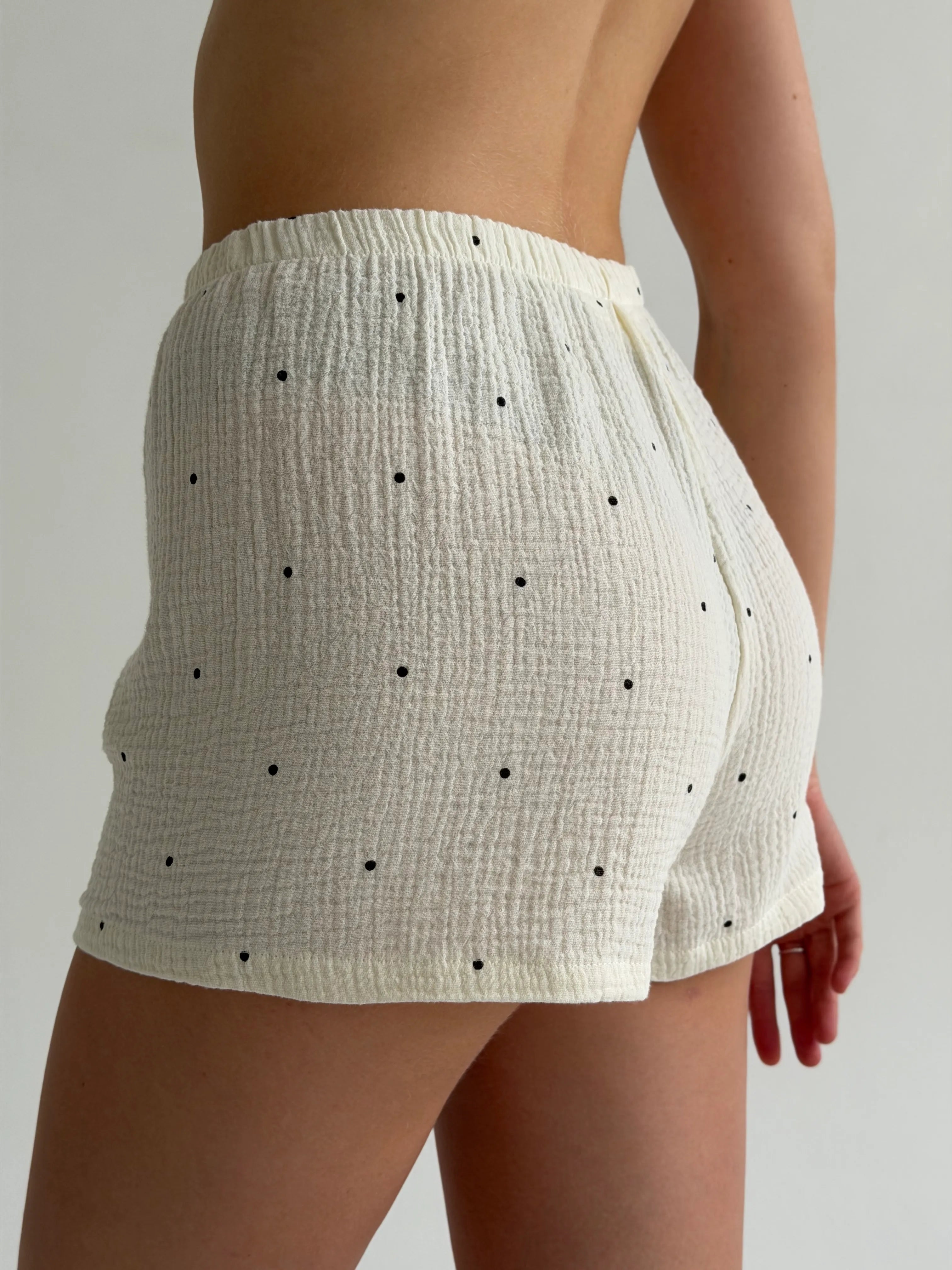Long sleeve shirt and muslin shorts suit, large black polka dots on milky