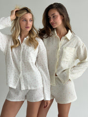 Long sleeve shirt and muslin tulip shorts suit on white