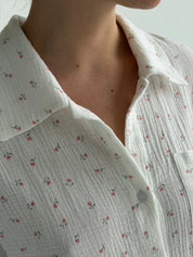Long sleeve shirt and muslin tulip shorts suit on white