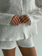 Long sleeve shirt and muslin tulip shorts suit on white