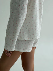Long sleeve shirt and muslin tulip shorts suit on white