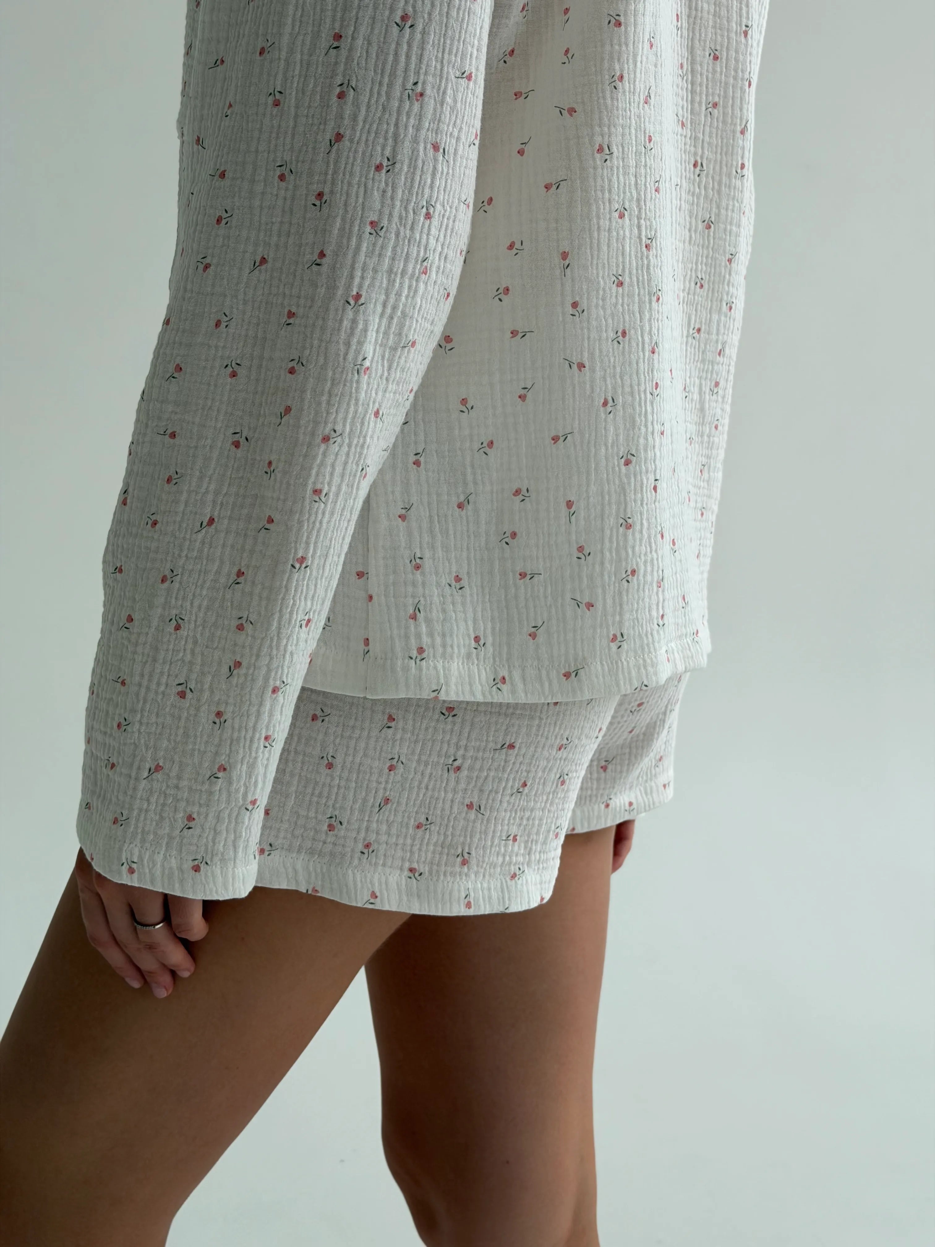 Long sleeve shirt and muslin tulip shorts suit on white
