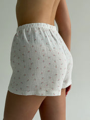 Long sleeve shirt and muslin tulip shorts suit on white