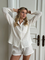 Long sleeve shirt and muslin tulip shorts suit on white