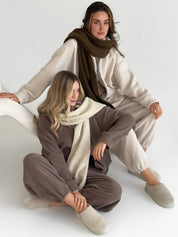 Knitted scarf beige melange