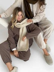 Knitted scarf beige melange