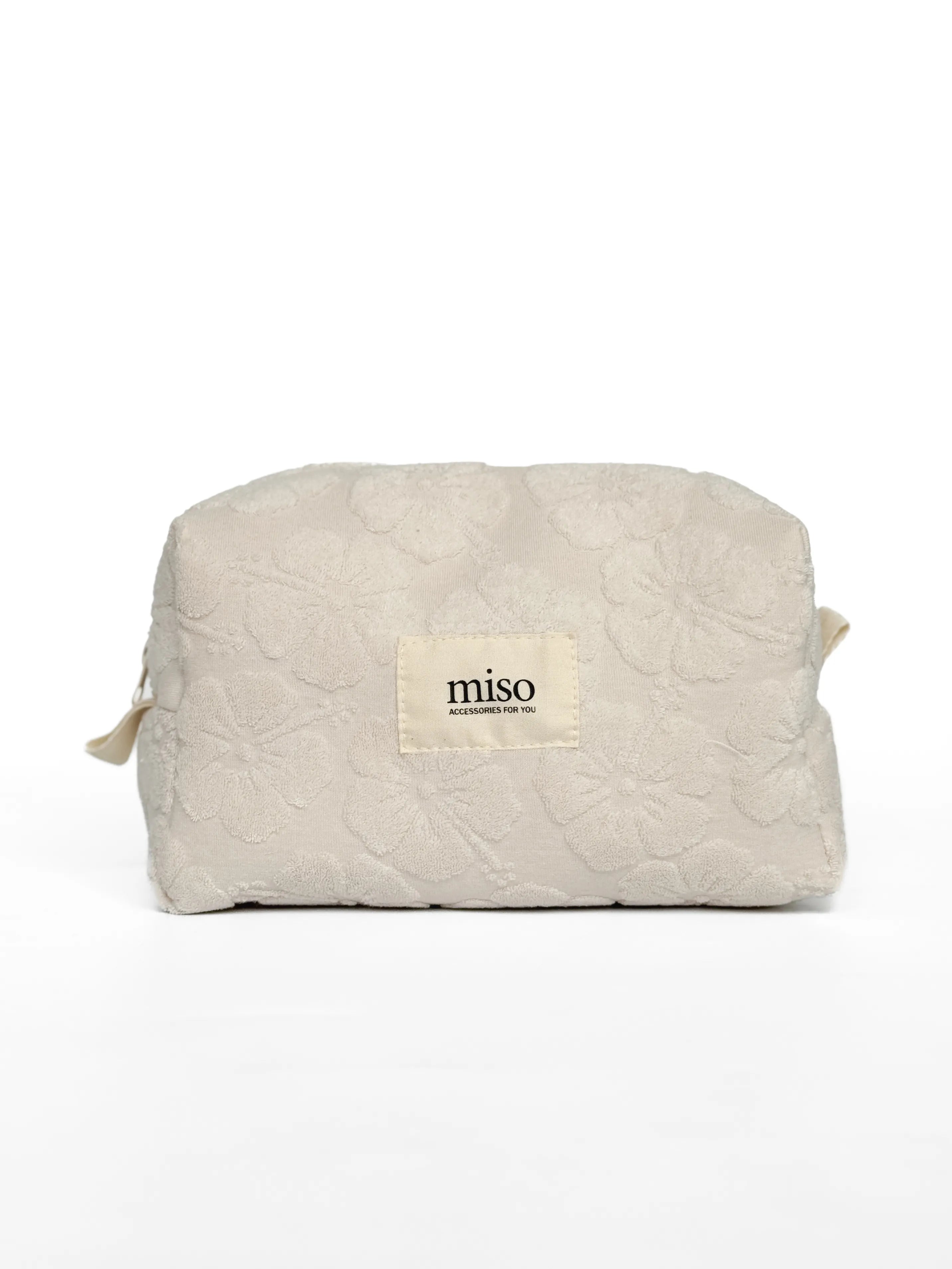 Medium jacquard terry cosmetic bag with flowers, milky color