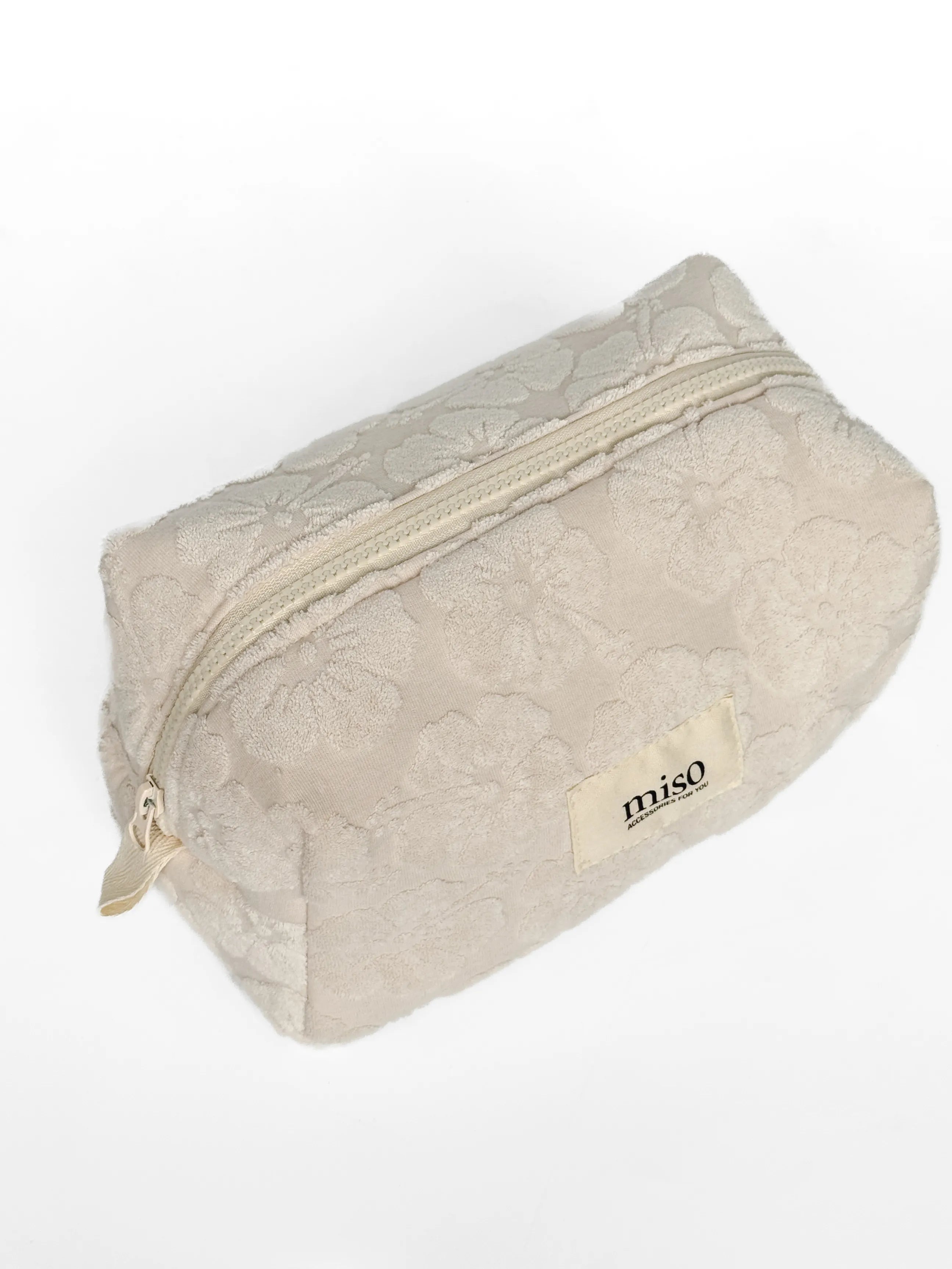 Medium jacquard terry cosmetic bag with flowers, milky color